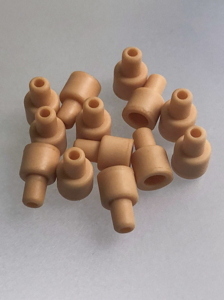 Plasticoid Compression Molding - Plasticoid Company